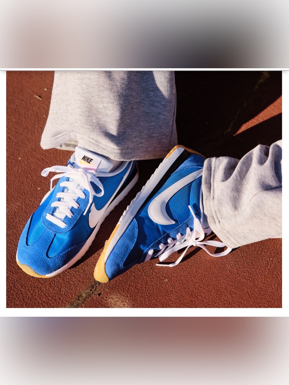 Nike Women’s Blue Retro Runner Sneakers with White Swoosh